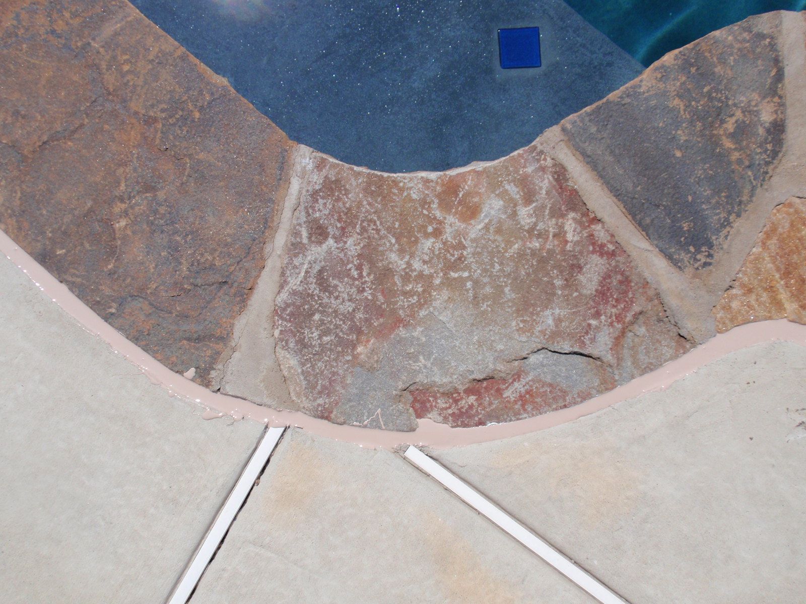 Natural stone pool surround and coping